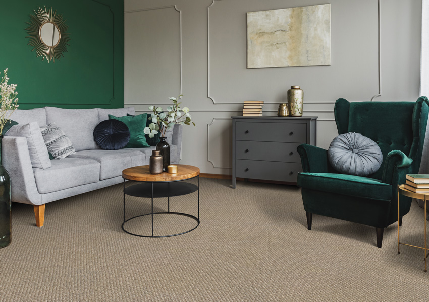 beige carpet in living room with vintage decor.